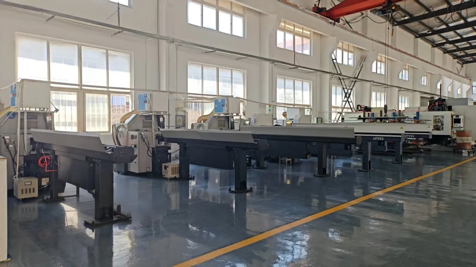 Swiss-type lathe line with bar feeders
